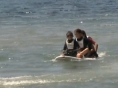Surfing w trójkącie za motorówką
